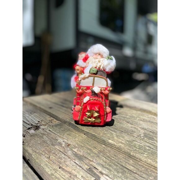 Santa Claus his helpers toys in a car￼ - Picture 13 of 16